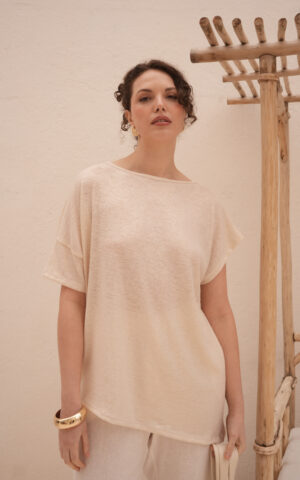 Blusa asimetrica cuello bote brillos