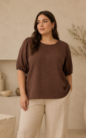 Blusa con frunces hombros y elástico puños