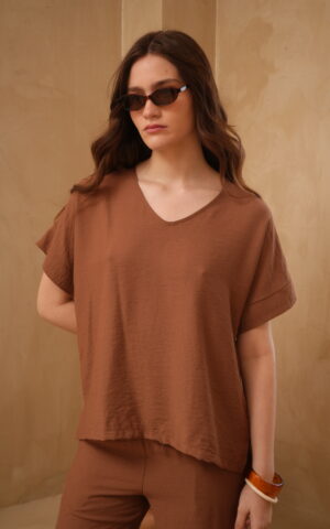 Blusa manga murcielago con tajos derby liso
